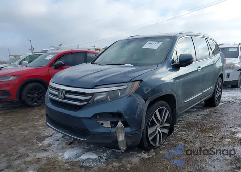 2017 Honda Pilot Touring z USA, uszkodzony, nr VIN 5FNYF6H95HB028638